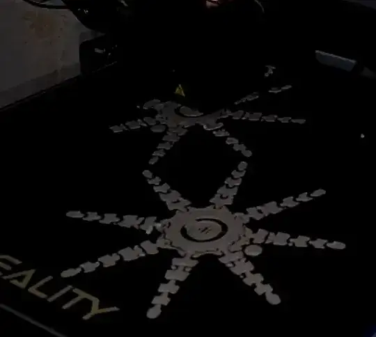 Photo of the first few layers of a printed model with edges curling up Photo of the first few layers of a printed model with edges curling up