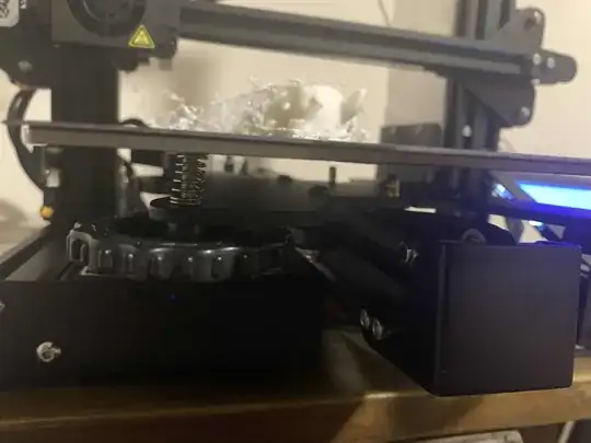 Photo of a model printed halfway through with 'spaghetti' but from the side