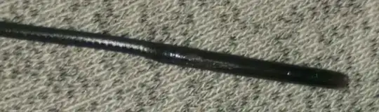 Photo of filament with different sized diameter after being pulled from hotend