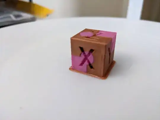 A dual-colour cube showing good X/Y alignment