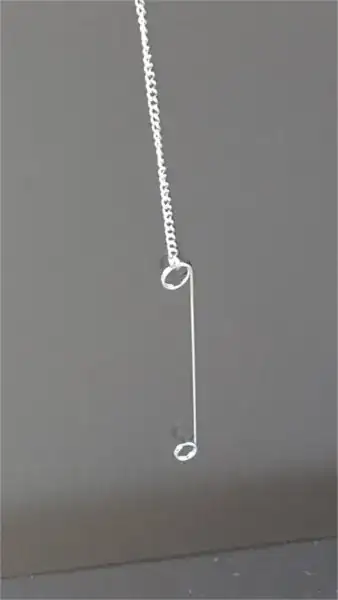 item hanging from left side of grill