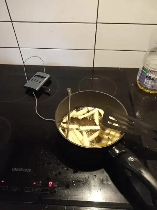 The setup. The oil is deep but the fries are floating on top.