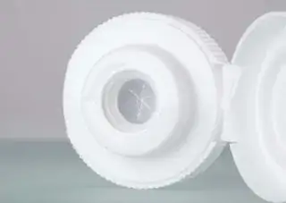 Lid with rubber valve