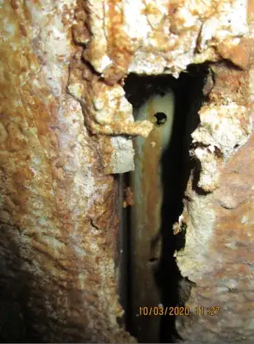 perforated pipe within construction joint