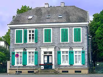 Facade and roof are made of slate