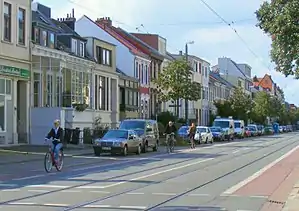 A German two-way street with strictly separating cycle lanes.Tagging: cycleway=lane + cycleway:lane=exclusive