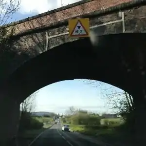 United Kingdom:maxheight=16'0"(tag the road under the railway bridge)