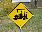 Golf cart warning sign