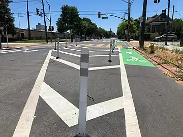 flex_post – flexible bollards/posts/delineators, often made of plastic, that buckle when vehicles run over them.