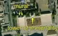 4/7 City centre of a large city with two murals (artwork_type=mural and tourism=artwork), recognisable because they have the shape of a wall that leaves a shadow, with nothing around it, and a tower of immortality (historic=memorial), with its shadow cast on the ground, (Maxar satellite imagery). One of the murals was added after 2011, the year Kim Jong-il died.