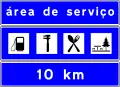 Exemplo de sinal de uma área de serviço a 10km numa autoestrada em Portugal