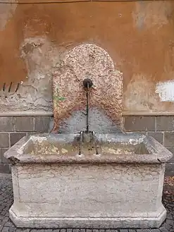A historical drinking fountain, Trento, Italy