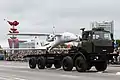 A military drone being carried by an offroad vehicle from MZKT.