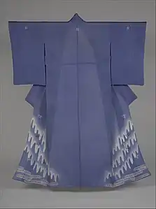 Summer overkimono of translucent fabric, showing that the excess fabric in the okumi (front edge) is not cut, but sewn into the eri (collar)