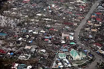 Image 2Aerial image of destroyed houses in Tacloban, following Typhoon Haiyan (from Effects of tropical cyclones)
