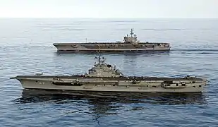 São Paulo (foreground) and USS&nbsp;Ronald Reagan during a combined training exercise in June 2004