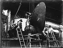 Cathay's new starboard propeller being fitted in March 1934 in Sutherland Dock, Cockatoo Island, Sydney, NSW