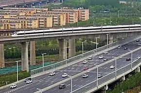 CRH6A-0422 on Zhengkai ICR passing over E. 3rd Ring Road 20190412 02.jpg