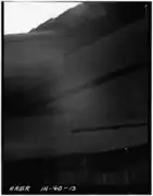 Detail of lower chord passing through double Burr Arch rings, viewed from below bridge (Note kerfs in arches)