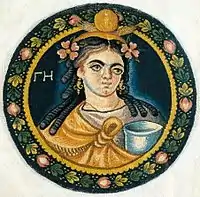 Coptic tapestry medallion showing Gaea wearing a mantle knotted on her breast. From Akhmim, 3rd or 4th century. Hermitage Museum