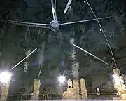 Zero point (warhead point) for shot Diamond Fortune. The test device would be affixed to the inverted tripod. The points extending from the walls are for blast measurement.