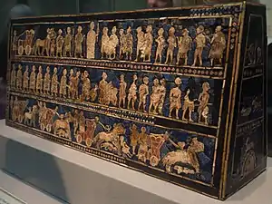 Standard of Ur (Sumerian); c.2600-2400 BC; shell, red limestone and lapis lazuli on wood; length: 49.5 cm; British Museum (London)