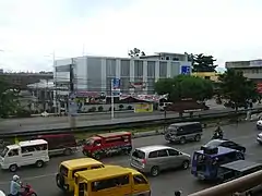 Development Bank of the Philippines and street scenario along J. C. Aquino Avenue Cor. J. Rosales Ave