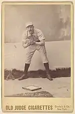 Doc Bushong on an 1888 Old Judge baseball card.