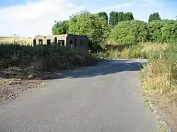 Derelict former guardroom at the site of RAF Abbots Bromley in 2006.
