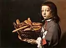 Boy with a Basket of Bread (c. 1655–1665)