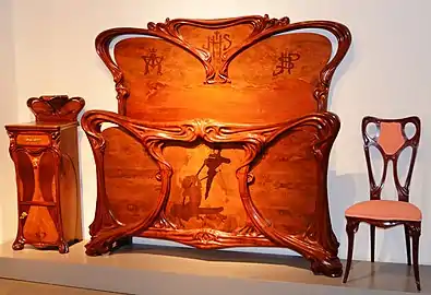 Headboard of bed by Gaspar Homar I Mezquida (1902). (Museu del Modernisme Català)