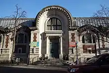 Western facade of the Hamilton Fish Recreation Center, made of brick and limestone