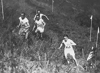 Image 29Edvin Wide, Ville Ritola, and Paavo Nurmi (on left) competing in the individual cross country race at the 1924 Summer Olympics in Paris; due to the hot weather, which exceeded 40 °C (104 °F), only 15 out of 38 competitors finished the race. (from Cross country running)