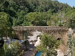 Bridge over Nahr (river) Damour known in English as the judges bridge. Was built by Emir Zayn ad-Dine at-Tannoukhi who was judge at Ain Ksour