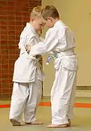 Image 49Two children training in judo techniques (from Judo)