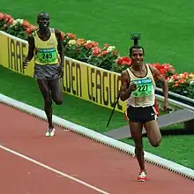 Image 13Kenenisa Bekele leading in a long-distance track event (from Track and field)