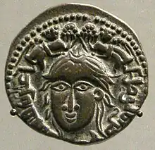 Coin of Nasir ad-Din Mahmud, mint of Mosul, depicting a female with two winged victories, 1223. British Museum.