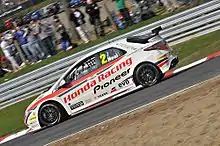 Neal driving the championship winning Civic at Brands Hatch in the 2011 BTCC season