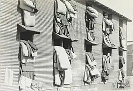 "Beds airing, Camp Funston, Kansas", in 1917 or 1918