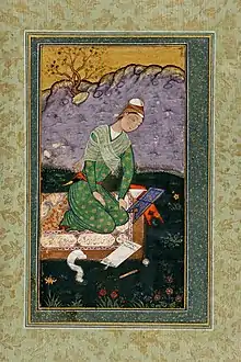 Mir Sayyid Ali's depiction of a young scholar in the Mughal Empire, reading and writing a commentary on the Quran, 1559.
