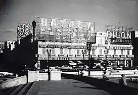 Neon signs at Calle Belascoain seen from Antonio Maceo Park