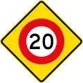 (W10-3) 20&nbsp;km/h speed limit ahead