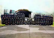 Men of the Squadron posing with one of their Folland Gnat fighter jets, a few months before the Indo-Pakistani War of 1971 broke out. Colorized.