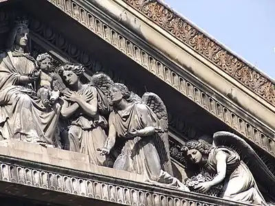 Detail of the tympanum; "Homage to the Virgin"