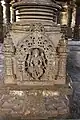 Pillar pedestal relief in the open hall in Kalleshvara temple at Bagali