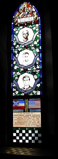 Stained glass window honoring James Chaney, Michael Schwerner, and Andrew Goodman.