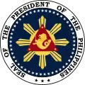 The Presidential seal dated 1965 . The ring of stars surrounding the presidential coat of arms was added in 1951.