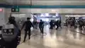 Special Tactical Squad run into Yuen Long Station concourse on July 27 2019