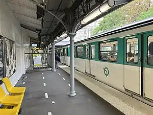 Colour photograph of a train at a train station