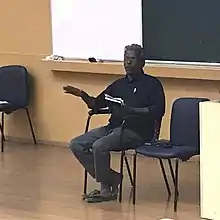 Sunny Kapicadu at a debate on Economic Reservation at IIT Bombay